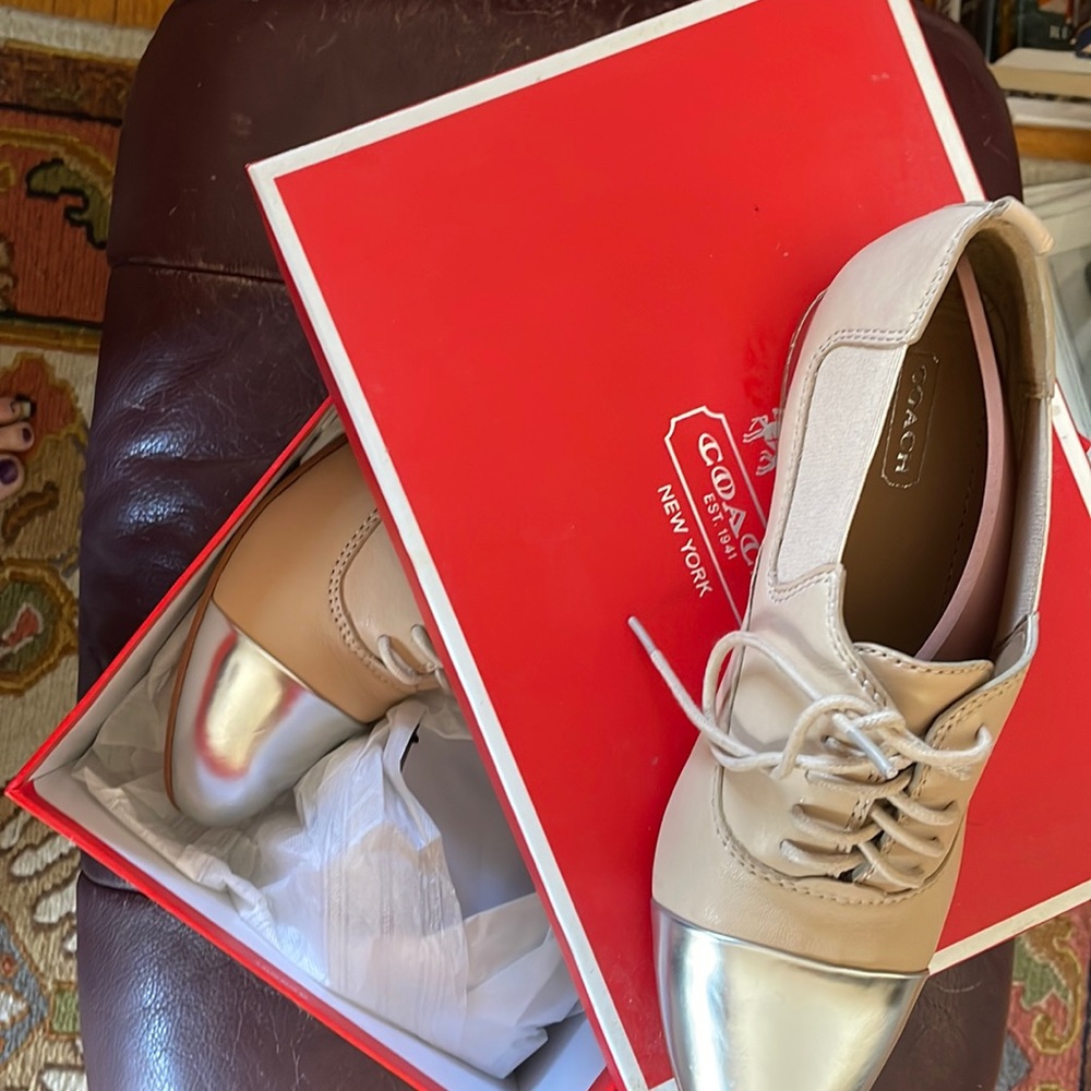 Coach natural/silver loafer.  Never worn original box